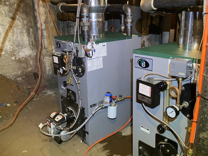 Oil-fired steam boilers installed by Rop Host HVAC in an apartment building